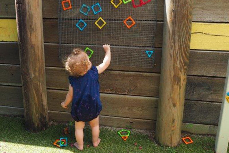 Toddler playing outside at Gympie child care